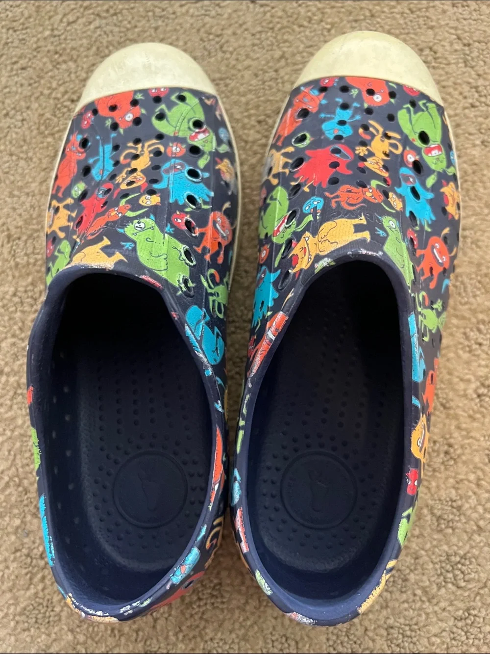 Native Kids Slip-On Shoes in Black with Multicolor Monster Print